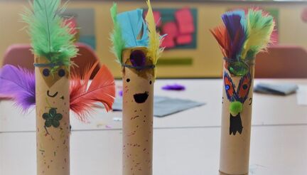 Three kazoos made from decorated cardboard tubes 